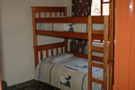 Double bunk bed in brick chalet